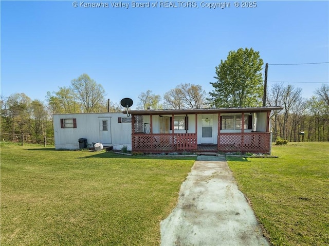 view of front of home with a porch and a front lawn