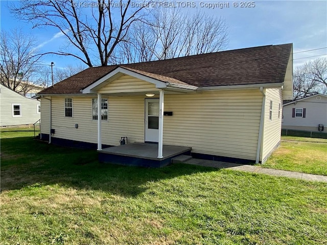 104, 102 1st St, Dunbar, WV 25064 - view of front of home featuring a shingled roof and a front yard