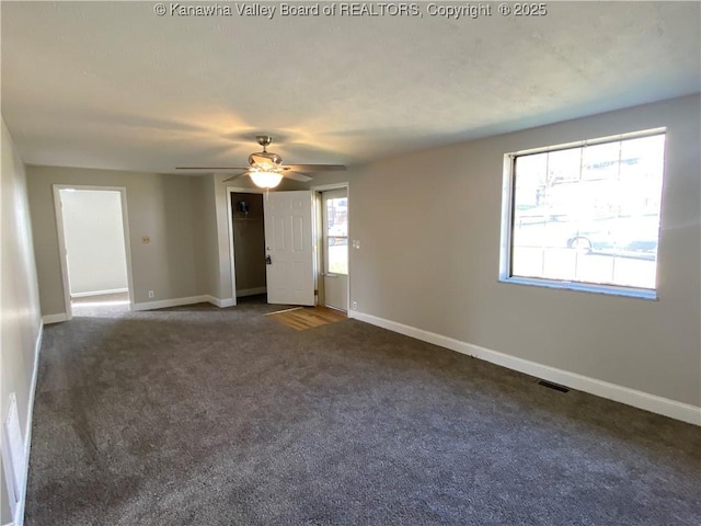 104, 102 1st St, Dunbar, WV 25064 - carpeted empty room featuring a ceiling fan and baseboards