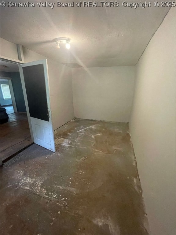 interior space featuring concrete flooring