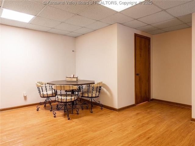5339 Pioneer Dr, Cross Lanes, WV 25313 - dining space featuring baseboards, a drop ceiling, and wood finished floors