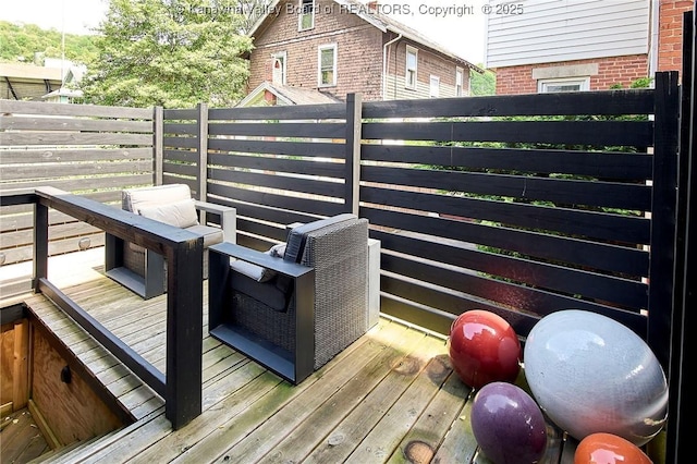 deck featuring fence