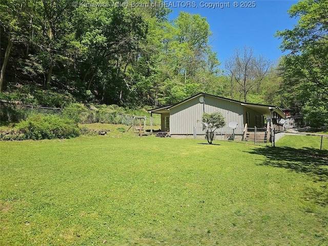 view of yard featuring fence