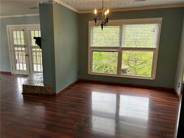 unfurnished dining area with baseboards, dark wood-style floors, and a chandelier