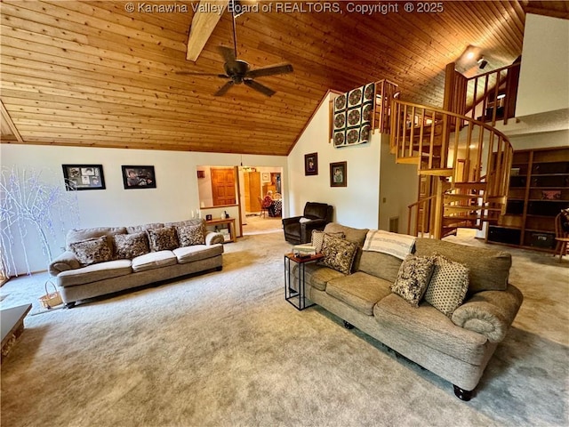 living area featuring high vaulted ceiling, carpet, a ceiling fan, and stairs