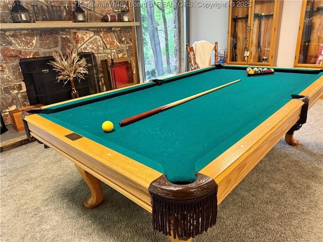 playroom featuring carpet, pool table, and a fireplace