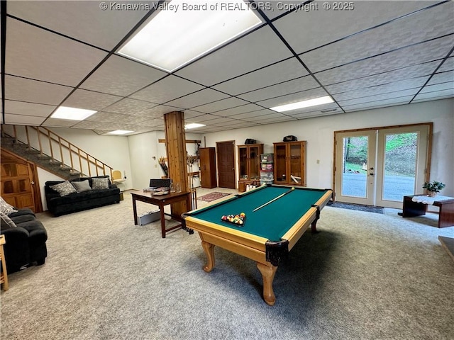 game room featuring pool table, a drop ceiling, french doors, and carpet