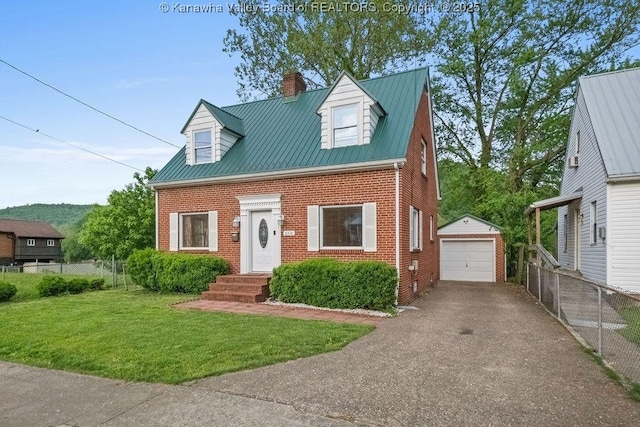 new england style home featuring brick siding, fence, a chimney, and aphalt driveway