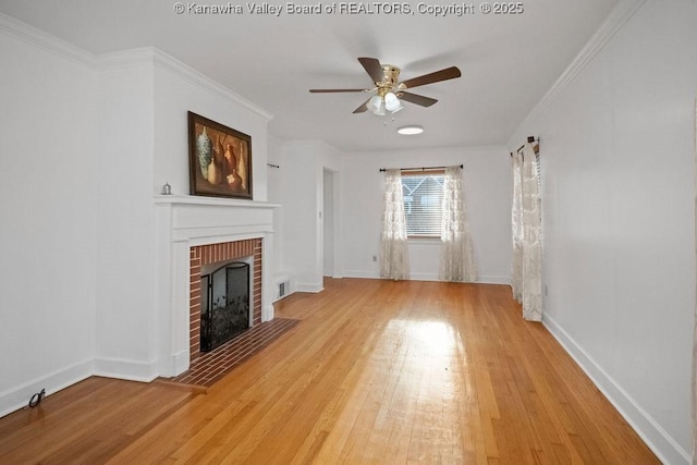 unfurnished living room featuring a fireplace, a ceiling fan, baseboards, light wood-type flooring, and visible vents