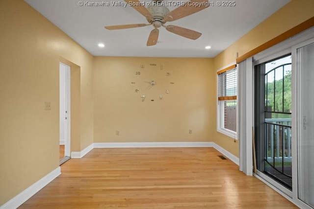 spare room with light wood-style floors, a ceiling fan, baseboards, recessed lighting, and visible vents
