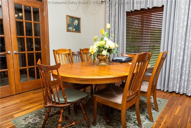 2804 Hash Ridge Rd, Barboursville, WV 25504 - dining area with french doors and wood finished floors