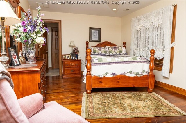 2804 Hash Ridge Rd, Barboursville, WV 25504 - bedroom with baseboards, wood finished floors, and visible vents