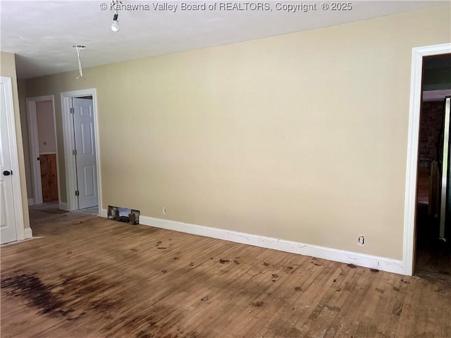 405 Crestview Dr, Charleston, WV 25302 - unfurnished room with baseboards and wood-type flooring
