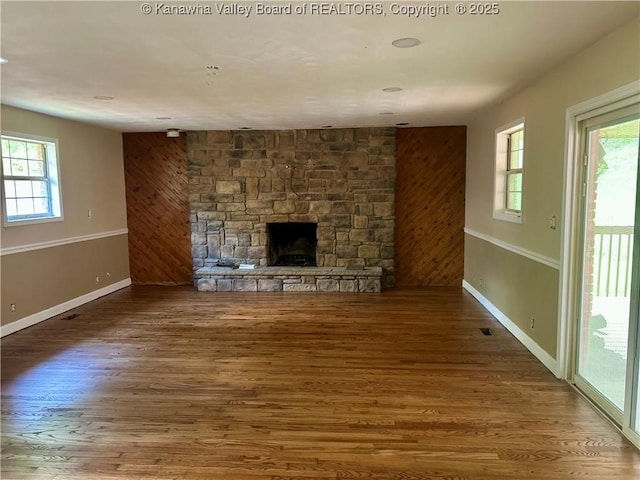 405 Crestview Dr, Charleston, WV 25302 - unfurnished living room with baseboards, wood finished floors, and a fireplace