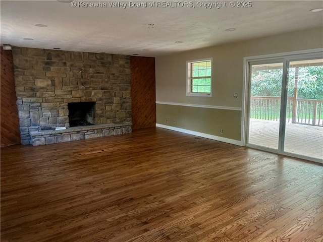 405 Crestview Dr, Charleston, WV 25302 - unfurnished living room featuring baseboards, wood finished floors, and a fireplace