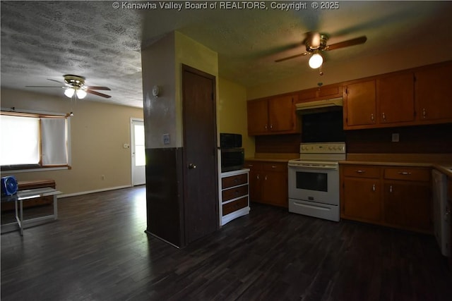 kitchen featuring brown cabinetry, plenty of natural light, ceiling fan, and white range with electric cooktop
