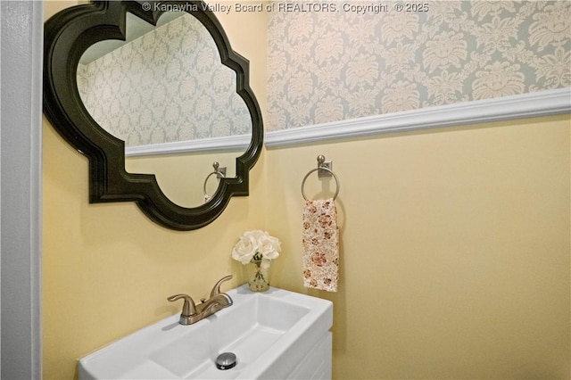315 27th St SE, Charleston, WV 25304 - bathroom with a sink and wallpapered walls