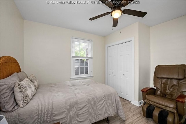 315 27th St SE, Charleston, WV 25304 - bedroom with baseboards, light wood-style floors, a closet, and ceiling fan