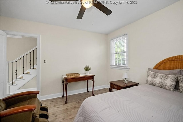 315 27th St SE, Charleston, WV 25304 - bedroom with baseboards, a ceiling fan, and wood finished floors