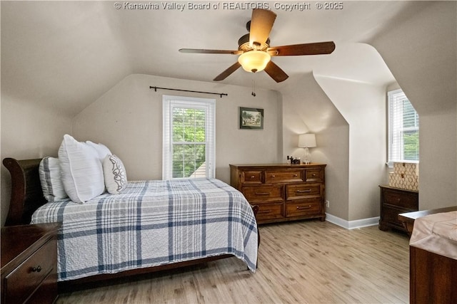 315 27th St SE, Charleston, WV 25304 - bedroom featuring vaulted ceiling, light wood-style flooring, baseboards, and ceiling fan