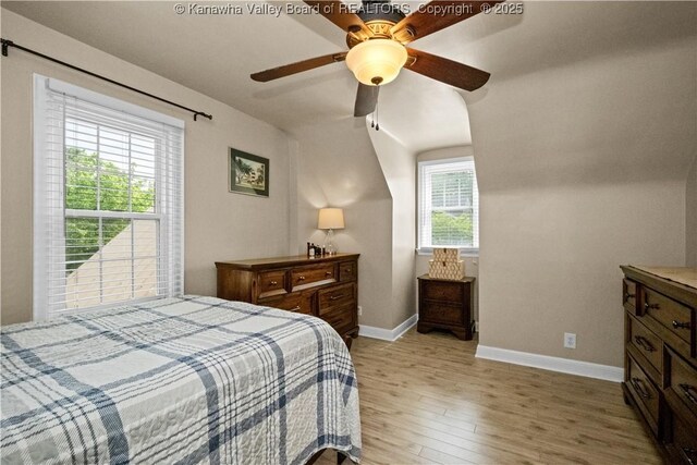 315 27th St SE, Charleston, WV 25304 - bedroom with light wood-style floors, baseboards, and ceiling fan