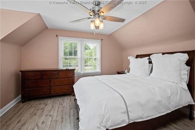 315 27th St SE, Charleston, WV 25304 - bedroom featuring vaulted ceiling, baseboards, light wood-type flooring, and a ceiling fan