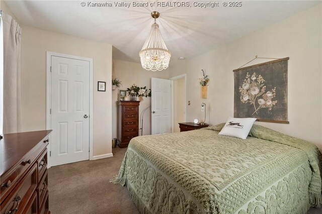 2258 Curtis Ave, Saint Albans, WV 25177 - bedroom featuring dark carpet and a notable chandelier