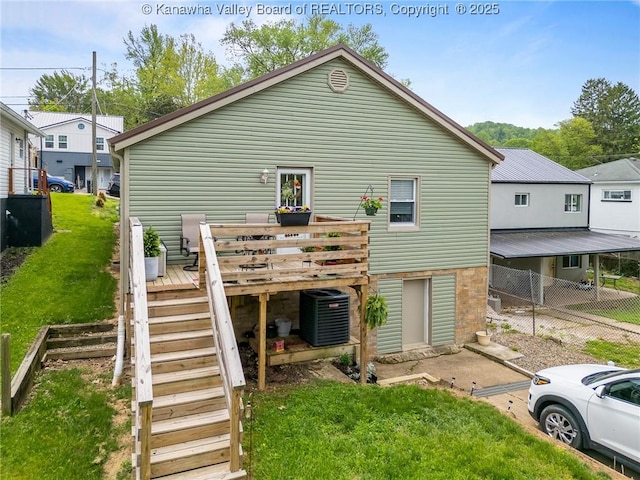 2258 Curtis Ave, Saint Albans, WV 25177 - back of house with a yard, fence, stairs, central AC unit, and a deck