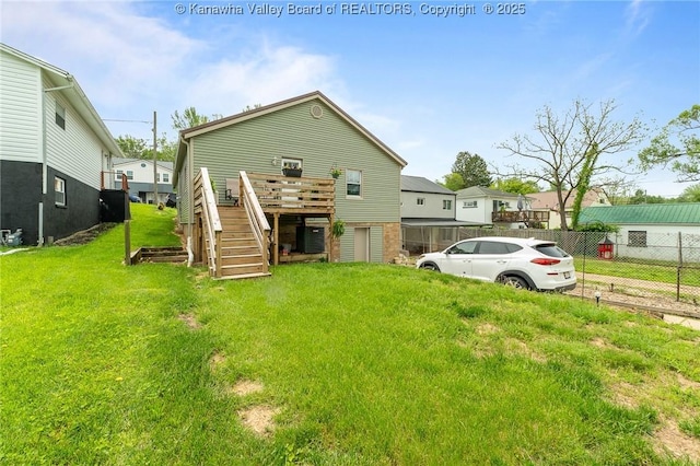 2258 Curtis Ave, Saint Albans, WV 25177 - exterior space with a front yard, stairway, a wooden deck, and fence