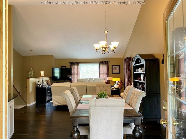 dining area with lofted ceiling, baseboards, dark wood finished floors, and a chandelier
