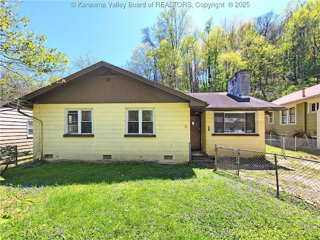 728 98th St, Charleston, WV 25315 - view of front of house featuring a chimney, a front yard, fence, and crawl space