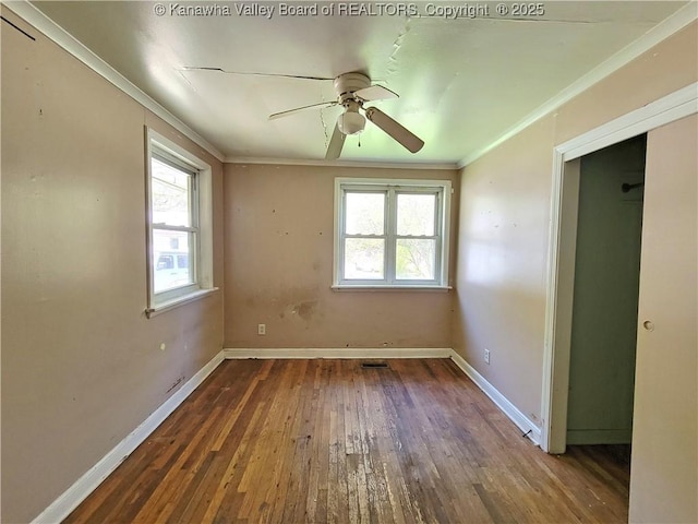 728 98th St, Charleston, WV 25315 - empty room featuring hardwood / wood-style floors, a healthy amount of sunlight, and crown molding