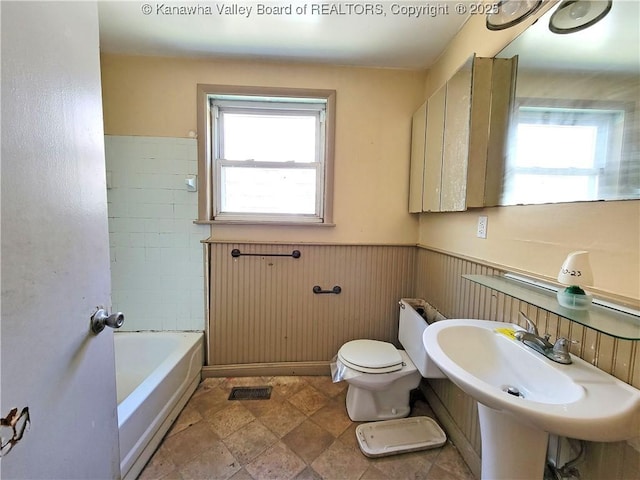 728 98th St, Charleston, WV 25315 - full bath featuring a sink, toilet, a wainscoted wall, a shower, and a bath