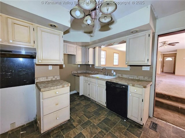 728 98th St, Charleston, WV 25315 - kitchen featuring ceiling fan with notable chandelier, a sink, black dishwasher, stone finish floor, and visible vents