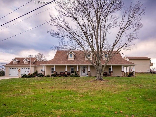 2648 Bedford Chapel, Milton, WV 25541 - view of front of property featuring a porch, a front lawn, concrete driveway, and a garage