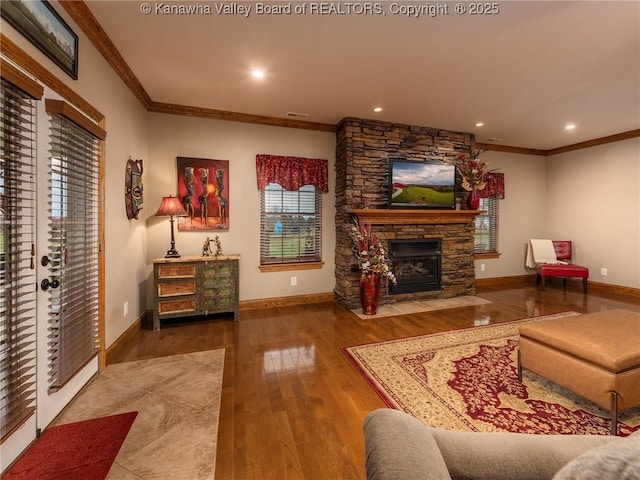 2648 Bedford Chapel, Milton, WV 25541 - living area featuring crown molding, wood finished floors, a fireplace, recessed lighting, and baseboards