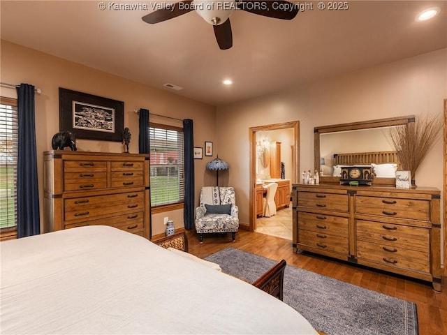 2648 Bedford Chapel, Milton, WV 25541 - bedroom featuring wood finished floors, connected bathroom, recessed lighting, baseboards, and a ceiling fan
