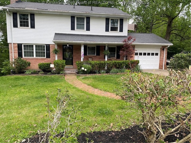 1407 Longridge Rd, Charleston, WV 25314 - traditional home featuring brick siding, an attached garage, a front lawn, a chimney, and a porch