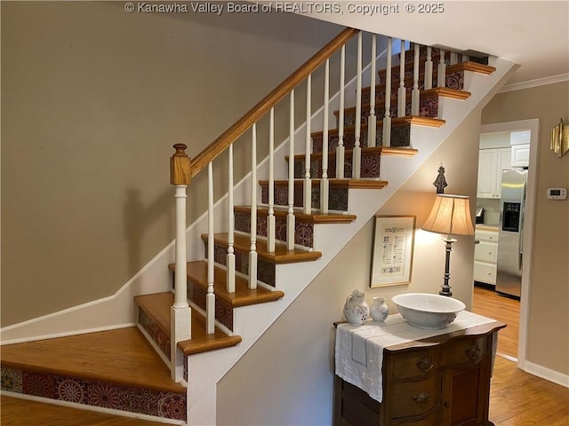 1407 Longridge Rd, Charleston, WV 25314 - stairs featuring wood finished floors, baseboards, and ornamental molding