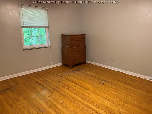 1407 Longridge Rd, Charleston, WV 25314 - spare room with hardwood / wood-style flooring and baseboards