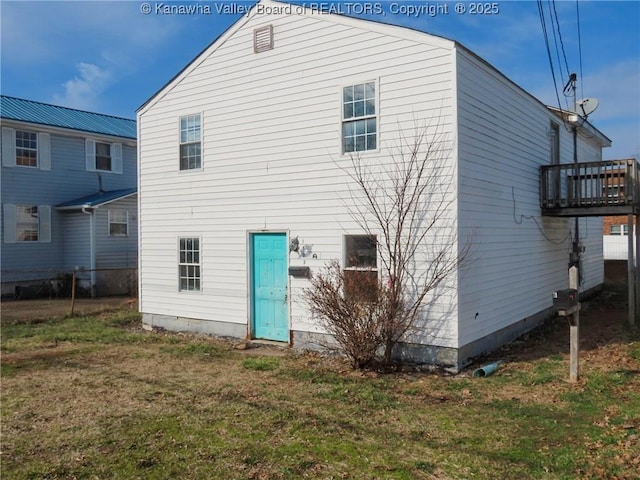 1908 Washington Ave, Saint Albans, WV 25177 - rear view of house featuring a lawn