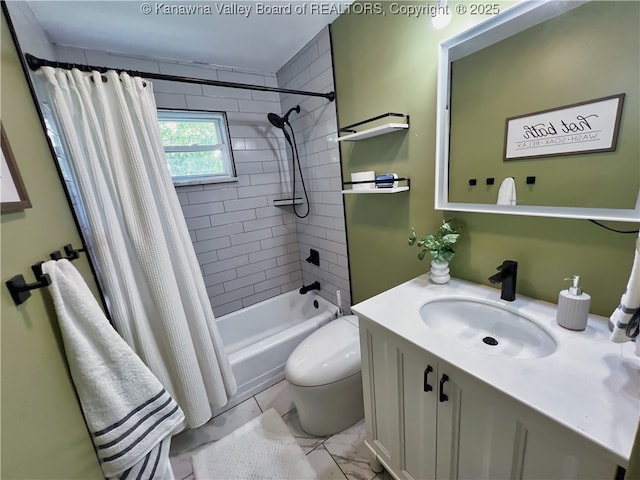 full bathroom with toilet, vanity, shower / bath combo with shower curtain, and marble look tiles