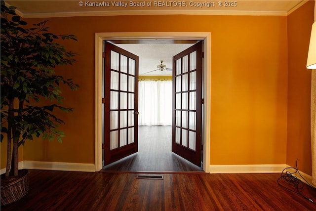 1518 Dogwood Rd, Charleston, WV 25314 - doorway to outside featuring wood finished floors, baseboards, and ornamental molding