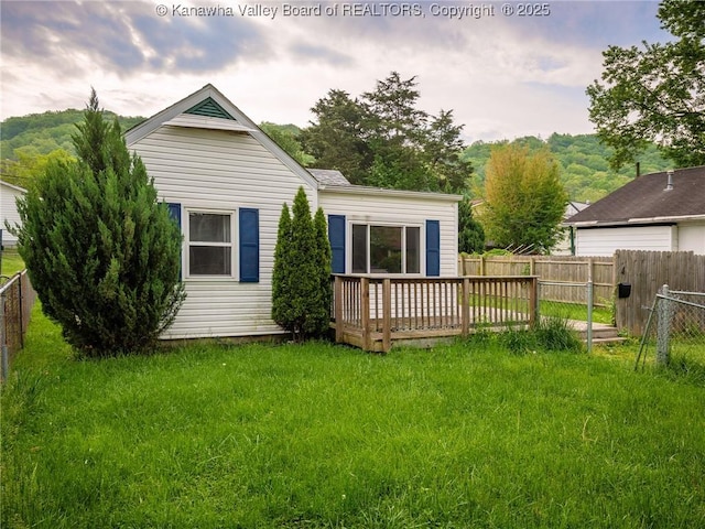 4 Main Ave, Nitro, WV 25143 - back of house featuring a wooden deck