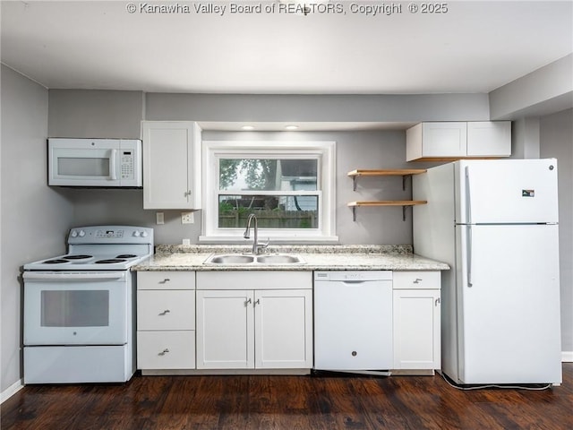 4 Main Ave, Nitro, WV 25143 - kitchen featuring white appliances, a sink, white cabinetry, light stone countertops, and dark wood finished floors