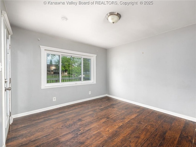 4 Main Ave, Nitro, WV 25143 - unfurnished room with dark wood-style floors and baseboards