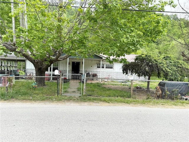 12027 Chap Rd, Wv, WV 25204 - view of front of property with a fenced front yard, a gate, and board and batten siding