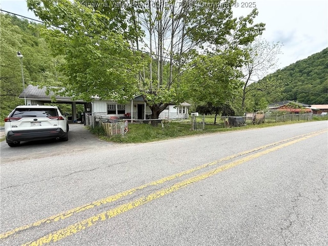 12027 Chap Rd, Wv, WV 25204 - view of front of home featuring asphalt driveway