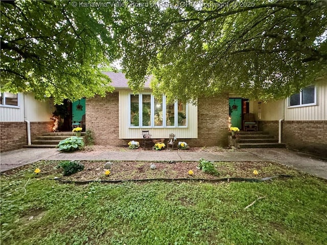 back of property with brick siding