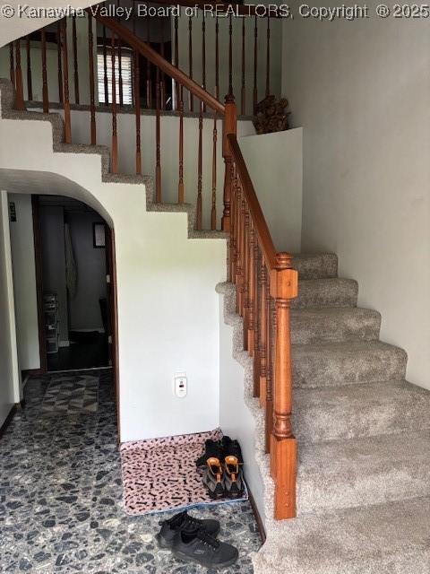 5222 Dalewood Dr, Charleston, WV 25313 - stairway with arched walkways